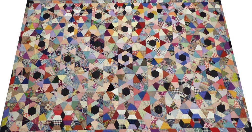 Lot 2015 - Circa 1930's Mainly Silk Patchwork Quilt, some later fabrics, diamond shapes, six-point stars,...