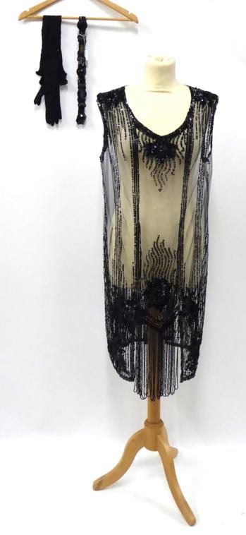 Lot 2116 - Circa 1920s Black Net Flapper Dress, with sequin appliquÅ½s, together with a Pair of Long Black...