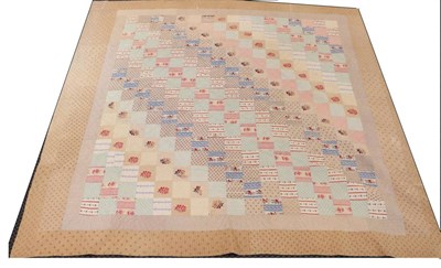 Lot 2013 - 19th Century Patchwork Quilt, comprising square patches in coloured printed cottons, within two...