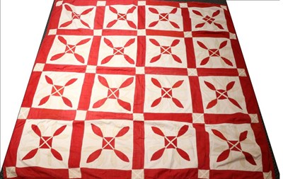 Lot 2028 - 19th Century Red and White Patchwork Cover, appliqued with tulips within red squares and red...