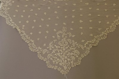 Lot 2059 - Late 19th Century Brussels Lace Applique Shawl, of triangular shape, on net base, decorated...