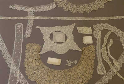 Lot 2060 - Assorted Lace, including two 19th century Carrickmacross lace trims, each 119cm by 4cm; cotton baby