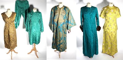 Lot 2091 - Possibly Indian Early 20th Century Turquoise Silk Robe, woven with  gilt threads in a stylish...