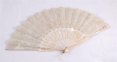 Lot 2096 - Mid 19th Century Brussels Lace Fan, on mother of pearl intricately carved sticks and guards,...