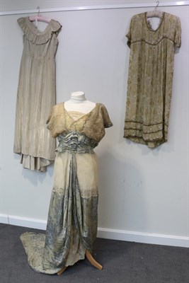 Lot 2124 - Early 1900s Sleeveless Shift Dress in silk georgette, woven with a floral design in gold and...