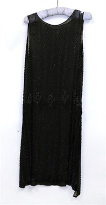 Lot 2128 - Circa 1920s Sheer Black Tabard Style Drop Waist Dress, decorated with beads