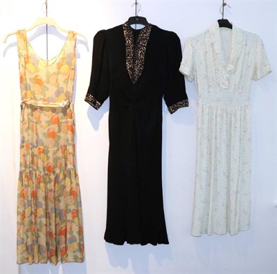 Lot 2143 - Circa 1930s Sleeveless Floral Cotton Summer Dress, with tiered skirt and fabric belt; Black...