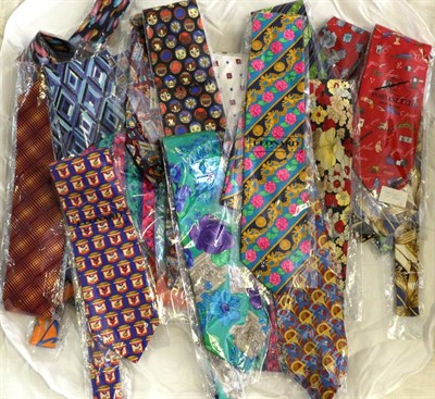 Lot 2148 - Thirty Men's Designer Silk Ties, in flamboyant colours and designs, including brands such as...