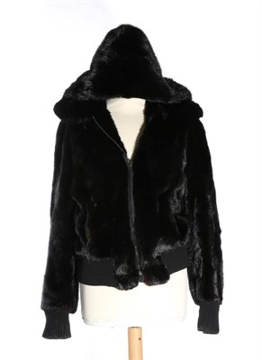 Lot 2158 - A Black Mink Zipped Jacket, with long sleeves, ribbed cuffs and waist, with detachable hood