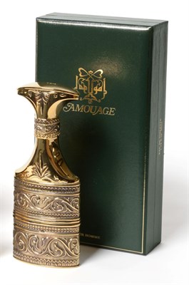 Lot 2174 - Amouage Homme Silver Gilt Flask and Stopper Modelled as a Persian Dagger, with embossed decoration