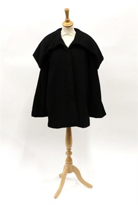 Lot 2210 - Alexander McQueen Black Cashmere Coat, with deep shawl collar and enclosed button fastening...