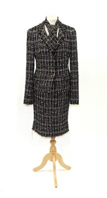 Lot 2233 - Chanel Black, White, Grey and Red Boucle Two Piece Suit, comprising jacket / blazer with...