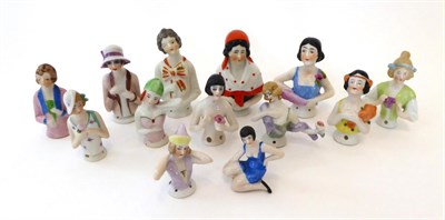 Lot 2001 - Twelve Assorted China Half Dolls, primarily in the 'flapper' style in a variety of poses; and a...