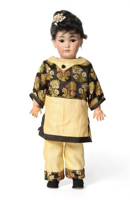 Lot 2009 - Simon and Halbig 1329 Oriental Bisque Socket Head Doll, with pierced ears, sleeping brown eyes,...