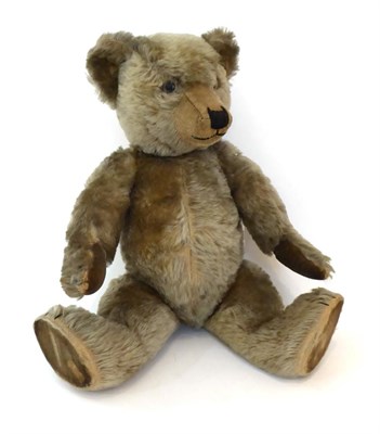 Lot 2019 - Circa 1940/50s Chiltern Hugmee Teddy Bear, with black stitched nose, glass eyes, velvet pads,...