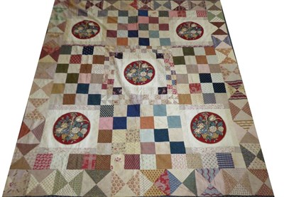 Lot 2046 - Early 19th Century Cotton Patchwork Cover, with central square printed with a basket of...