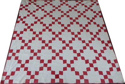 Lot 2049 - Large 19th Century Turkey Red and White Irish Chain Quilt, hand quilting in zig zag pattern, within