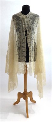 Lot 2081 - Late 19th Century Limerick Lace Wedding Cape,  with scalloped hem and floral design, with later...