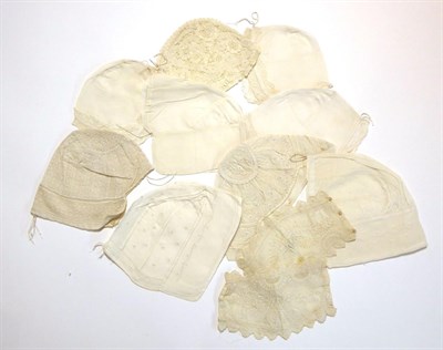 Lot 2083 - 19th Century White Cotton Baby Bonnets and Christening Caps, including a floral appliquÅ½ lace...