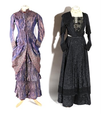 Lot 2116 - Circa 1880 Purple Silk Day Dress, with long sleeves, smocking detail to the round collar and waist