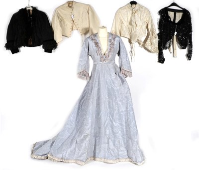 Lot 2119 - 19th Century Costume, comprising a pale blue silk taffeta dress with half length sleeves,...