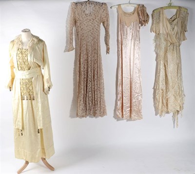 Lot 2129 - Circa 1920s Wedding Dress, with machine lace and pale peach silk to the bodice, with silk...