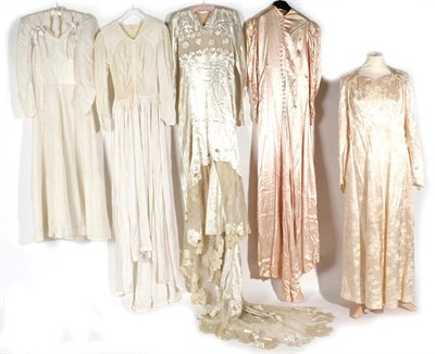 Lot 2130 - Early 20th Century Wedding Dresses, including a White Velvet Long Sleeved Example with ruched...