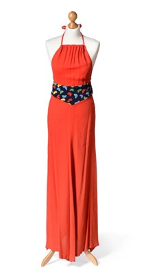 Lot 2161 - A 1970's Ossie Clark for Radley Red Crepe Maxi Dress, with gathered halter neckline, the dark...