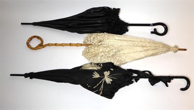 Lot 2194 - Early 20th Century Parasol, with bamboo simulated handle and cream lace tiered mount,...