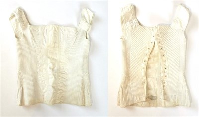 Lot 2232 - Circa 1820s White Cotton Corset, with decorative quilted detailing, including the elongated...