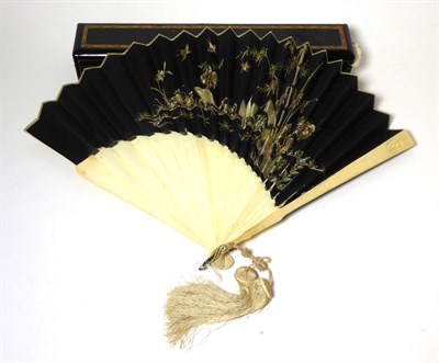 Lot 2236 - An Early 20th Century Chinese Ivory Fan, with stepped plain ivory sticks, each guard carved...