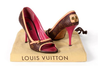 Lot 2274 - Pair of Louis Vuitton 2006 Perforated Monogram Open-Toe Shoes, trimmed in beige leather and fuschia