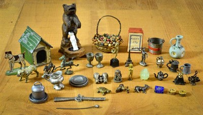 Lot 2020 - A Group of Assorted Vintage Dolls House Accessories, including a lead painted bulldog, standing...