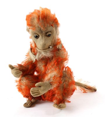 Lot 2032 - Circa 1920s Schuco Orange Tipped Mohair Smoking Monkey bent limb with jointed arms, crouched...