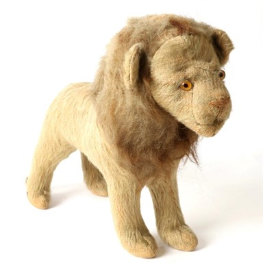 Lot 2035 - Circa 1920/30s Mohair Standing Lion Soft Toy, with brown horizontal stitched nose, glass eyes, mane