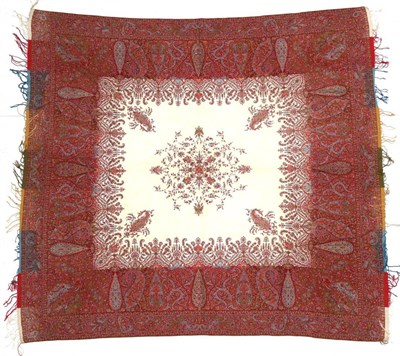 Lot 2038 - A 19th Century French Shawl possibly Nimes, woven with paisley designs to the border leading to the