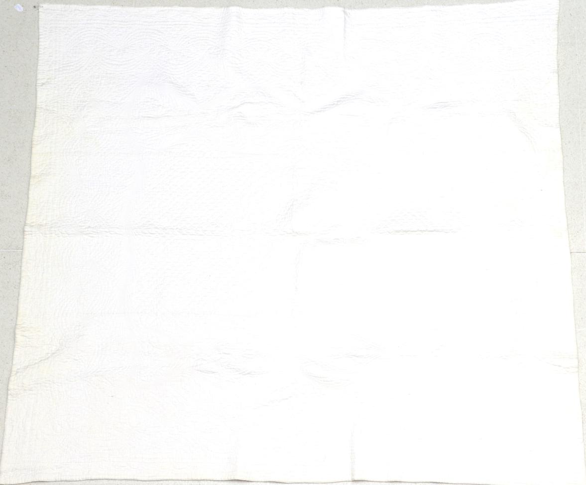 Lot 2056 - Late 19th Century White Quilt, finely quilted with a central circular pattern with a variety of...