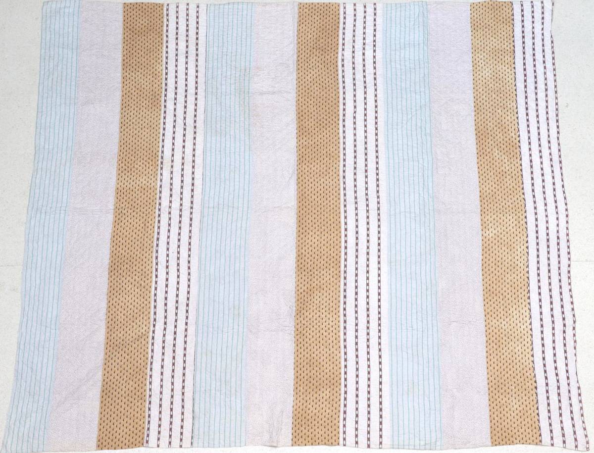 Lot 2060 - A Large 19th Century Strippy Quilt, in decorative Victorian floral sprigged and other coloured...