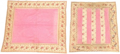 Lot 2061 - An Early 20th Century Reversible Quilt, in a dark cream printed with pink roses and pink stripes to