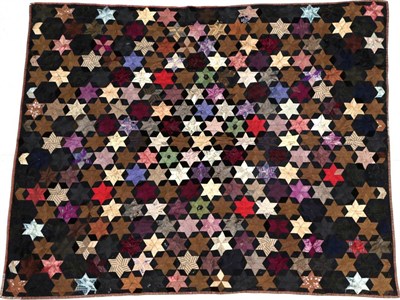Lot 2066 - 19th Century Patchwork Quilt, decorated with coloured stars overall in coloured silks on a...