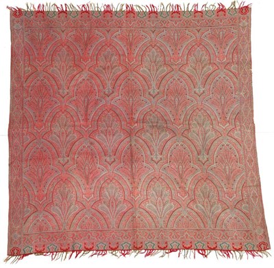 Lot 2067 - An Edwardian Woven Paisley Shawl, primarily in red and green, 180cm by 170cm    Provenance:...