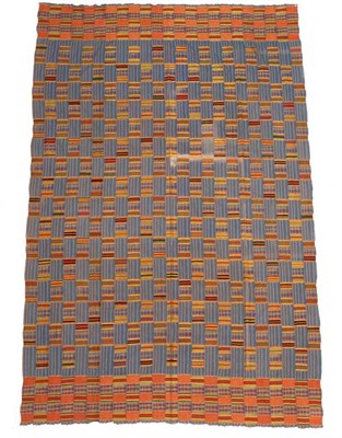 Lot 2204 - Early 20th Century Ghanian Kente Cloth, incorporating strips of blue stripes, alternating with...