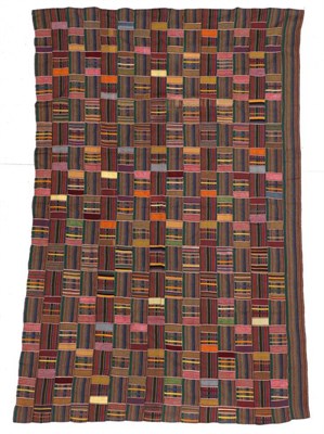 Lot 2209 - Early 20th Century Ghanian Kente Cloth, incorporating strips of woven striped cotton in green,...