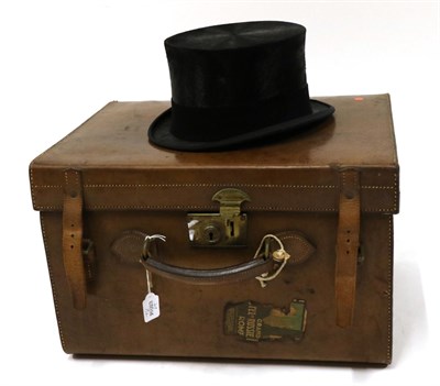 Lot 2236 - Henry Heath Tan Leather Hinged Hat Box, with brass fastener, leather handle, two leather straps and