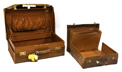 Lot 2271 - Finnigans Bond Street London Brown Leather Suitcase, with outer canvas cover, initialled to the...