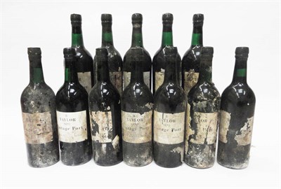 Lot 214 - Taylor 1970, vintage port, some heavily bin-soiled labels (x12) (twelve bottles)  With copies...