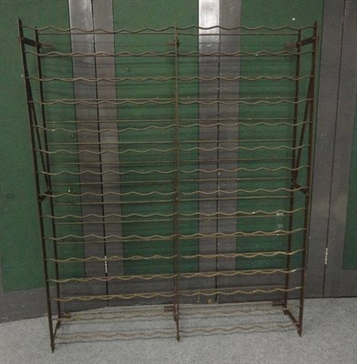 Lot 297 - An Iron Wine Rack, to accommodate 180 bottles, wall mounted