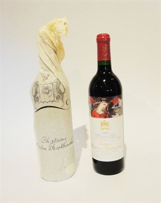 Lot 35 - Chateau Mouton Rothschild 1985, Pauillac (x2) (two bottles) U: into neck, one with tissue wrap...