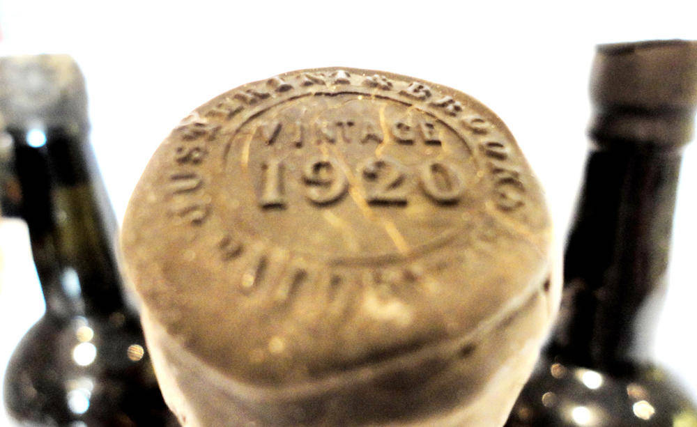 Lot 180 - "Unknown" 1920, vintage port, capsule reads "Justerini and Brooks... VINTAGE 1920" (x3) (three...