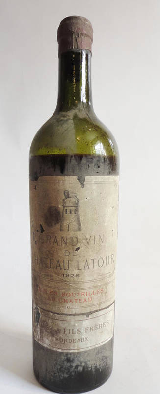 Lot 6 - Chateau Latour 1926, Pauillac U: low shoulder, nicked label, shrivelled cork, trimmed and torn...